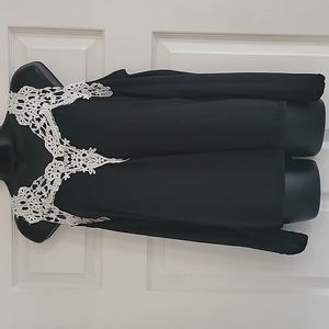 Black cut out shoulders white lace